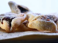 אוזני המן-מיקי שמו